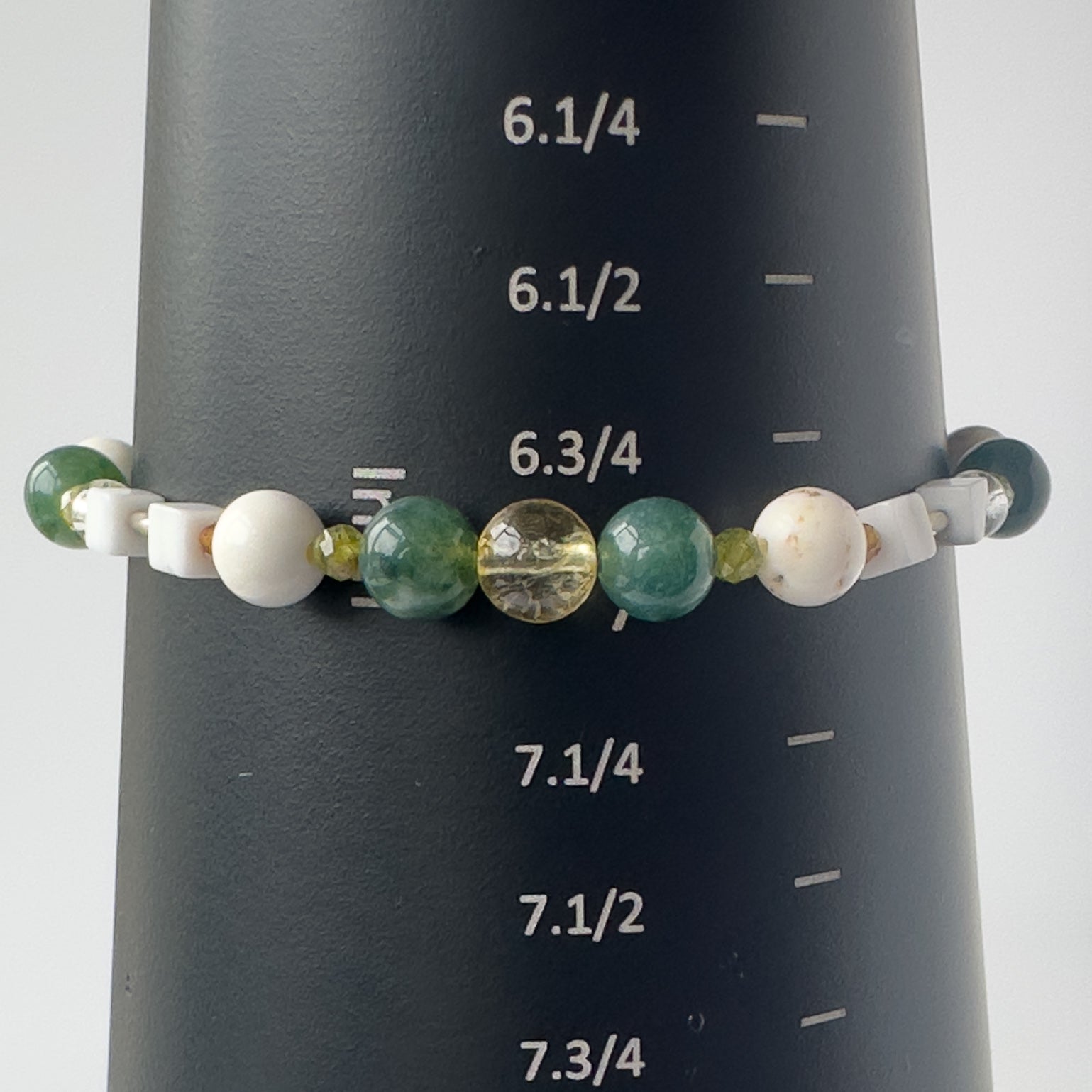 Virgo Birthstone Healing Crystal bracelet for Love and Compassion on mandrel showing size as 7 inches