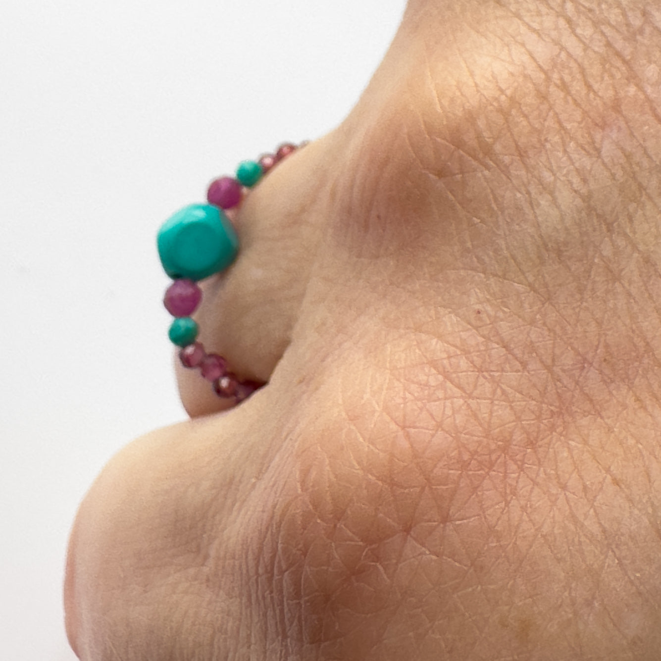 profile view Courage Birthstone Healing Crystal Ring for Leo, Capricorn, Sagittarius & Scorpio on finger